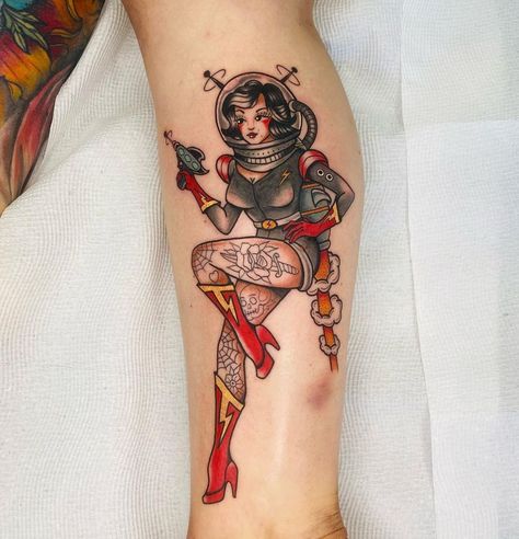 @blackeagletattoos on Instagram: “Space girl by @blackeagletattoos #traditionalpinuptattoo #oldschoolpinuptattoo #pinupstyle #pinuptattoo #spacegirl #spacepinuptattoo…” Pinup Space Tattoo, Space Lady Tattoo, Traditional Galaxy Tattoo, Space Woman Tattoo, Alien Pinup Tattoo, Fire Tattoos For Women, Pin Up Tattoos Traditional, Tattoos Of People, Pin Up Traditional Tattoo