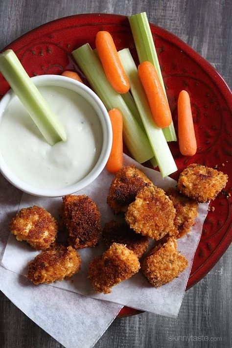 A plate of crispy breaded buffalo chicken nuggets with celery and carrot sticks and creamy dipping sauce. Buffalo Chicken Nuggets, Homemade Chicken Nuggets Baked, Buffalo Chicken Appetizers, Baked Chicken Nuggets, Baked Buffalo Chicken, Chicken Nugget Recipes, Chicken Appetizers, Skinny Taste Recipes, Chicken Nuggets