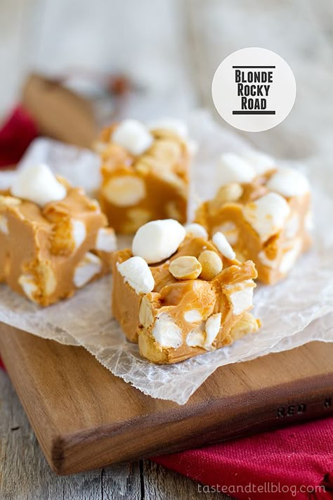 Blonde Rocky Road Recipe ~ Butterscotch, peanut butter, marshmallows and peanuts – these candies are little bites of heaven! Butterscotch Rocky Road Squares, Peanut Butter Rocky Road Bars, Marshmallow And Peanut Butter Squares, Almond Bark Peanuts Marshmallows, Rocky Road Squares, Peanut Butter Pretzel Butterscotch Blondies, Cherrios Bars Marshmallow Peanut Butter, Treats For Santa, Marshmallow Fudge