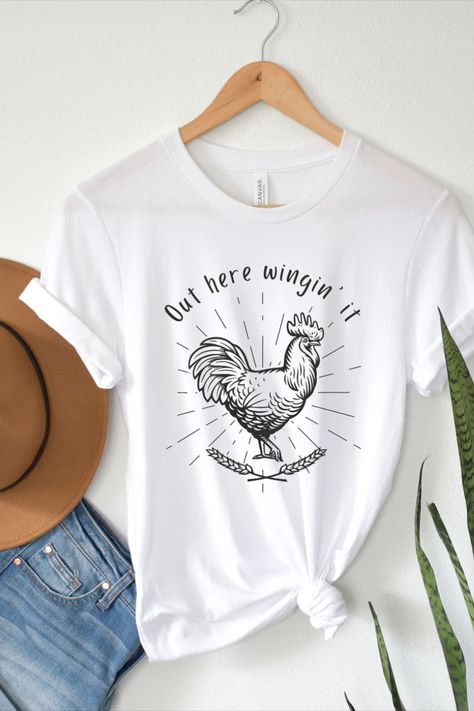 Out Here Wingin' It Unisex Jersey Tee Funny Farm Shirts, Farm Shirts, Farm Tshirt, Chicken Shirt, Funny Farm, Merch Ideas, Chicken Shirts, Funny T Shirt, T Shirt Funny