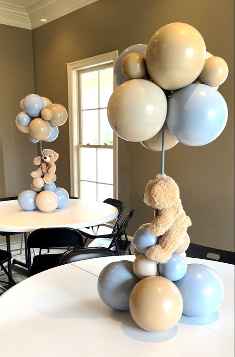 Dusty blue colored balloons baby boy nursery color, shower decorations Babyboy Baby Shower Decorations, Baby Shower Baloon Idea, Bear And Balloons Decoration, Teddy Bear Centerpieces With Balloons, Baby Boy Balloons Decoration, Babyshower Ideas Baby Boy, Babyshower Teddy Bear Boy, Brown And Blue Teddy Bear Baby Shower Theme, Bearly Wait Table Decor