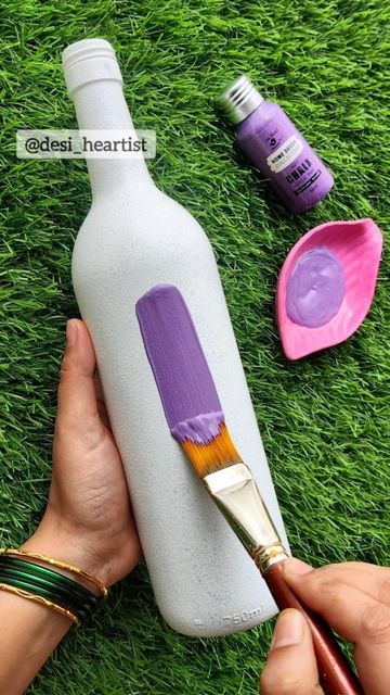 Art by Heart shared a post on Instagram: "Hey Purple Beauty💜💕 . . Watch full process video step by step on YouTube▶️ Link in bio🔄🔝 . . #dotartonbottle #bottleartlover #bottleartindia #bottleart #bottlecraft #easydiy #easybottleart #bottledecoration #bottledecor #bottlereuseidea #paintingoftheday #purple #pink #moneyplant #moneytree #bottlepainting #bottlereels #dotartbottleart #glassbottlepainting #glasspainting #happyheartist #jyoshitaghate". Follow their account to see 540 posts. How To Paint Glass Bottles Step By Step, Lavender Bottle Art, Purple Bottle Art, Easy Wine Bottle Painting Ideas, Glass Bottles Art Paint Aesthetic, Plastic Bottle Art Paint, Glass Bottle Painting Ideas Easy, Aesthetic Bottle Painting, Bottle Crafts Painting