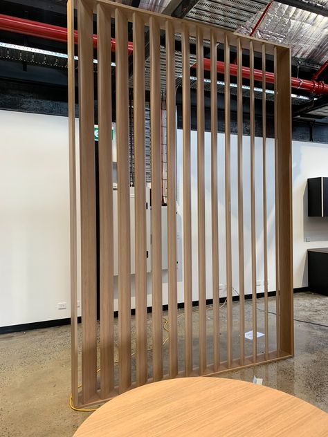 Wall Office Organization, Slat Wall Office, Slat Room Divider, Diy Sliding Door, Wooden Room Dividers, Wall Office, Timber Slats, Bookshelves In Living Room, Staircase Wall