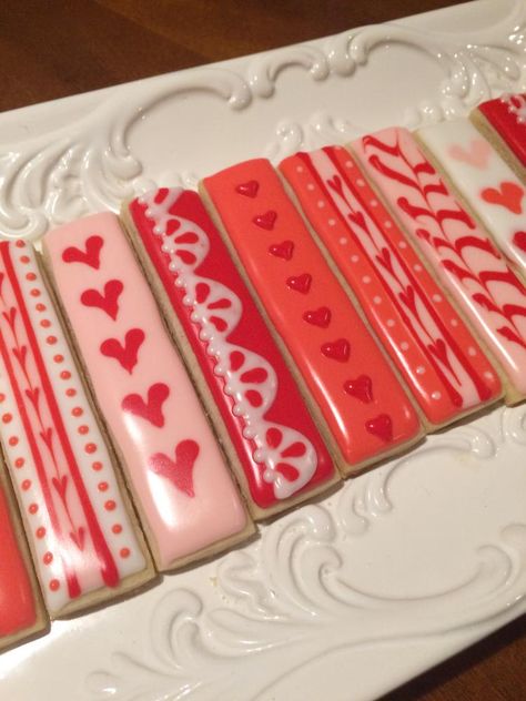 Valentine cookie sticks Cookie Sticks Valentines Day, Valentines Cookie, Painted Cookies, Valentine Cookie, Valentine Sugar Cookies, Valentines Baking, Cookie Sticks, Sugar Cookie Royal Icing, Cookie Business