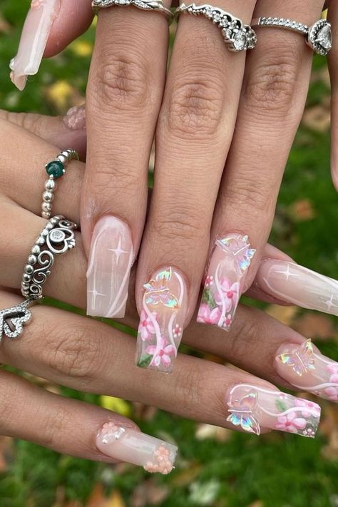 40 Super Cute Whimsical Nails for a Fun and Quirky Mani Inspo Enchanted Forest Nails Pink, Pink Butterfly Nails, Whimsical Nails, Fairy Nail Art, Hawaiian Flower Nails, Pink Stiletto Nails, Stiletto Shaped Nails, Pink Flower Nails, Iridescent Butterfly