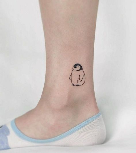 45+ Penguin Tattoos with Meanings - Body Art Guru Tiny Penguin Tattoo, Small Penguin Tattoo, Penguin Tattoo Ideas, Golden Tattoo, Small Penguin, Duck Tattoos, Penguin Tattoo, Chrysanthemum Tattoo, Mushroom Tattoos