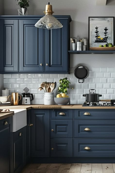 Blue Cabinets With Black Appliances, Navy Cabinets With Granite Countertops, Best Dark Blue For Cabinets, Navy Blue Cabinets Butcher Block Counter, Navy Blue Galley Kitchen, Kitchen Cabinets Painted Blue, Blue Kitchen Cabinets With Wood Counter, Blue Brass Kitchen, Kitchen Backsplash With Navy Cabinets