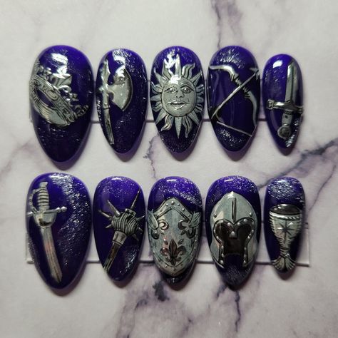 Set of hand-painted, medium almond shaped press-on nails with a medieval knight themed design. Comes with 1 sheet of nail adhesive tabs (24 pcs). -If you wish to purchase this design in a different shape or length, please message me prior to purchasing so I can accommodate your preference. Please do not order sets of 10 if you are not confident in what your nail sizes are, as I do not want you to receive nails that do not fit properly Midevil Nail Art, Royalcore Nails, Nail Art Themes, Medieval Nail Art, Greek Mythology Nails, Lotr Nails, Medieval Nails, Protection Nails, Geode Nail Art