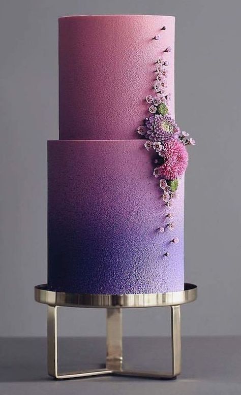 Design perfection on a cake that goes from purple to pink with the most delicate floral design by cakecoachonline. #unique #weddingcakedesign #elegant Hexagon Wedding Cake, Colorful Wedding Cakes, Painted Wedding Cake, Wedding Cake Ombre, Wedding Cake Prices, Cake With Flowers, Pretty Wedding Cakes, Wedding Cake Pictures, Black Wedding Cakes