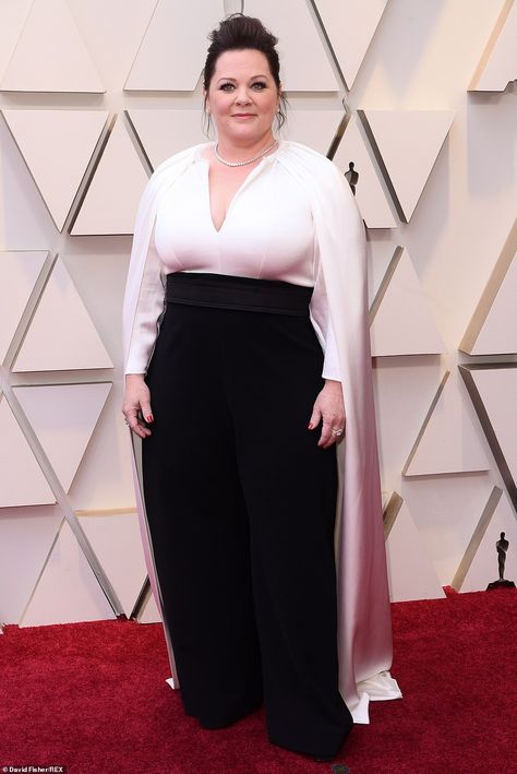 Fancy: Melissa McCarthy looked incredible in her black and white jumpsuit with a cape detail Red Carpet Dress Plus Size, 2019 Red Carpet, Vintage Reference, Melissa Mccarthy, Old Hollywood Glamour, White Jumpsuit, On The Red Carpet, Red Carpet Dresses, Academy Awards