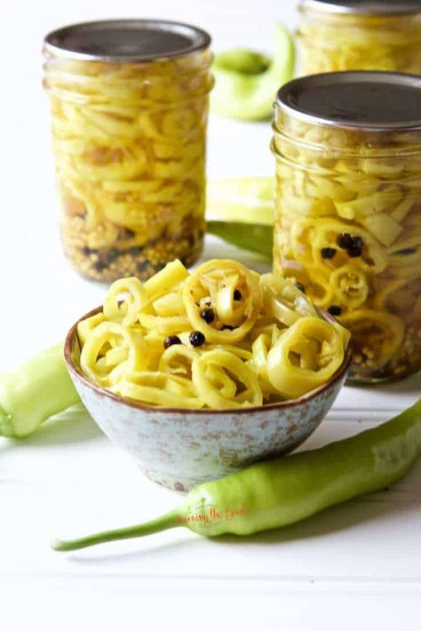 This is the easiest pickled banana peppers recipe. These are the best pickled banana peppers because they are crips, spicy and ready in hours instead of days. Canning crisp banana peppers has never been this quick or this delicious! I use the sous vide method of cooking to quickly pickle banana peppers. The lower temperature ensures the peppers retail their crunch while having the sweet banana peppers pickle in hours instead of days. I have water bath canning instructions for those of you who Pickled Banana Peppers Recipe, Banana Pepper Recipe, Pickle Banana Peppers Recipe, Banana Peppers Recipe, Canning Instructions, Canned Veggies, Canning Banana Peppers, Recipes With Banana Peppers, Sweet Banana Peppers