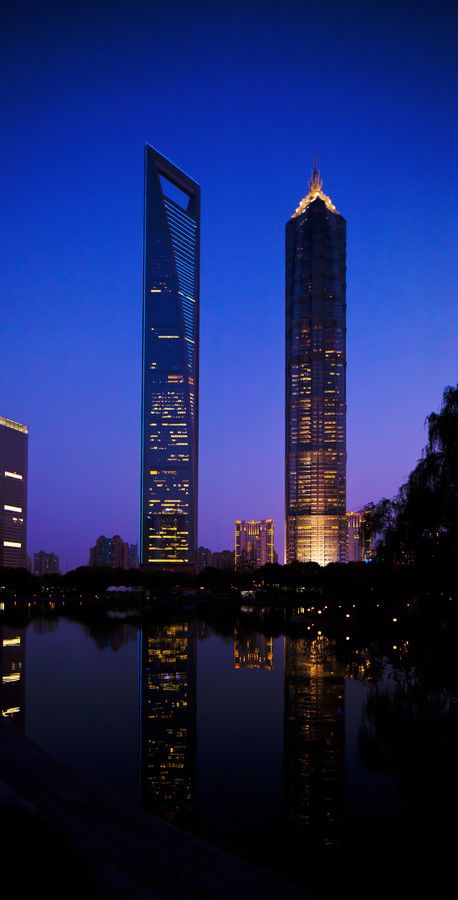 Jin Mao Tower - Shanghai, China Jin Mao Tower, Shanghai World Financial Center, World At Night, Postmodern Architecture, Sky Scrapers, Shanghai City, Yangtze River, River Flowing, Modern Skyscrapers