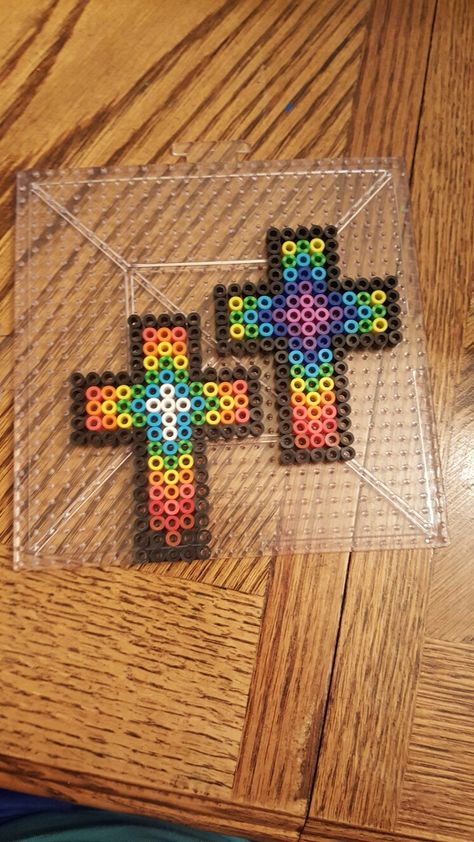 Perler Bead rainbow crosses. God bless! Cross Perler Bead Patterns, Perler Beads Cross, Christian Perler Bead Patterns, Cross Perler Beads, Easter Perler Bead Patterns, Perler Bead Rainbow, Perler Bead Bookmarks, Bead Rainbow, Modele Pixel Art