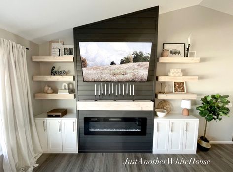 My husband and I completed this project together and could not be more proud of the outcome! We used Sherwin Williams Iron Ore #shiplap #shiplapfireplace #fireplace #blackfireplace #ironore #diy #diyfireplace #transitionallivingroom #transitionaldecor #studiomcgee #target #targethomedecor #lowes #sherwinwilliams #sherwinwilliamsironore #blackshiplap #electricfireplace Iron Ore Shiplap, Iron Ore Fireplace, Brick And Shiplap, Sherwin Williams Iron Ore, Diy Shiplap Fireplace, Farmhouse Shiplap, Tall Fireplace, White Wash Brick, Black Fireplace