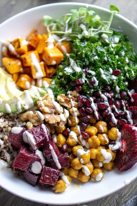 Vegan buddha bowl recipe with vegetables, leafy greens, quinoa, chickpeas, fruit, and nuts with lemon tahini dressing as the sauce. Buddha Bowl Sauce, Vegan Bowl Recipes, Power Bowl Recipe, Buddha Bowls Recipe, Vegan Buddha Bowl, Healthy Bowls Recipes, Lemon Tahini Dressing, Healthy Bowls, Lunch Bowl