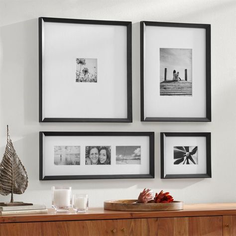 Shop Icon Black Frame Gallery, Set of 4.  Give a treasured photo the presentation it deserves with this classic frame.  The thick white mat and beveled black frame elevate the most casual snapshot, and the impeccable proportions and crisp black-and-white perfectly suit modern decor. Frame Arrangement, Gallery Wall Layout, Photo Wall Gallery, Frame Gallery, Black Picture Frames, Wall Frames, White Mat, Shop Icon, Wall Gallery