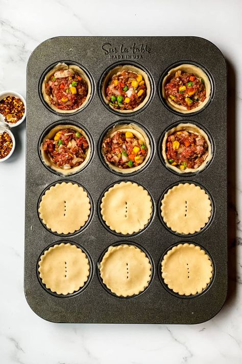 Pub Style Beef Pot Pies in Muffins Tins is a celebration in every bite. Simple to make, utterly delicious, fun to serve, and perfect as an appetizer or the main event. Freezer Baking, Mini Pot Pies, Hand Pies Savory, Beef Pot Pies, Savoury Pies, Beef Pies, Hand Pie Recipes, Pie Maker, Meat Pies