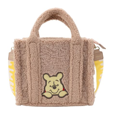 Brighten up your day with this Winnie the Pooh Sherpa Tote Bag With Detachable Strap. Its cozy sherpa design features graphics inspired by your favorite honey-loving bear, making it the perfect tote to carry around comfortably. This Winnie the Pooh bag's spacious interior will hold anything you need for your next big adventure. Winnie The Pooh Character, Convertible Tote Bag, Winnie The Pooh Plush, Convertible Crossbody Bag, Star Wars Toys, Crossbody Tote Bag, Pooh Bear, Disney Winnie The Pooh