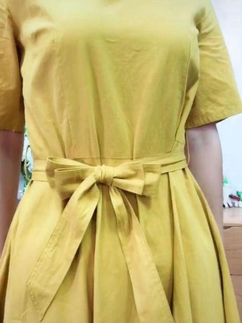 How to Tie a Bow Step by Step [Video] | Diy belt for dresses, Fashion hacks clothes, Refashion clothes How To Tie A Frock Knot, How To Tie Knots In Dresses, Diy Ribbon Belt For Dress, Tie Ribbon Dress, How To Tie Ribbon On Clothes, How To Tie A Ribbon On A Dress, How To Tie A Bow With Ribbon On A Dress, Dress Bow Tutorial, How To Tie A Bow On A Dress