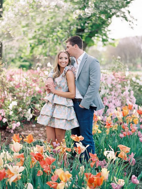 Engagement Garden Photoshoot, Flowers Engagement Photos, Spring Engagement Photo Ideas, Springtime Engagement Photos, Easter Photoshoot Couples, Tulip Engagement Photos, Engagement Photos Floral Dress, Engagement Photos Arboretum, Couple Spring Pictures