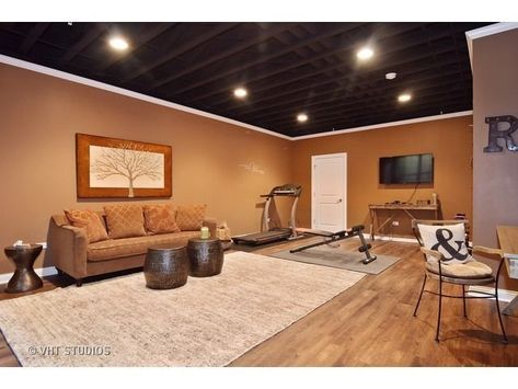 low ceiling unfinished basement bedroom ideas Basement Ceiling Ideas Cheap, Unfinished Basement Ceiling, Exposed Basement Ceiling, Basement Ceiling Painted, Cheap Basement Remodel, Ceiling Tiles Basement, Basement Ceiling Options, Low Ceiling Basement, Home Gym Flooring