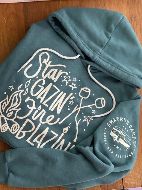 Campfire Hoodie Camp Hoodie Design, Trending Hoodies 2024, Camping Hoodie Ideas, Campfire Hoodie Svg, Cricut Hoodie Designs, Camping Sweatshirt Ideas, Camp Merch, Campfire Hoodie, Camping 2023