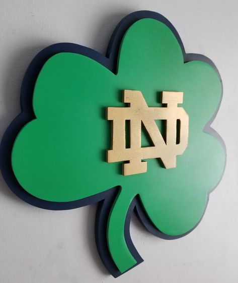 Notre Dame Fighting Irish Two Dimensional Sign. Approximately 17 inches tall x 16 inches wide. Great for any Notre Dame Fighting Irish fans man cave. Alligator clip on the back allows you to hang up securely with ease. Please contact me if you have any questions. Contact me for larger sizes. Notre Dame Man Cave, Notre Dame Birthday Party, Notre Dame Graduation Party, Noter Dame, Notre Dame Football, Pinterest Ideas, Scroll Saw Patterns, College Sports, Nov 6