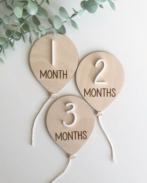 Keep your baby's closet organized with cute animal cutouts and stylish dividers that make dressing easy while adding charm to the nursery! 12 Balloons, Newborn Milestone, Wooden Milestone, Wooden Name Plaques, Wood Discs, Laser Cut Projects, Engraving Wood, Thoughtful Baby Shower Gifts, Milestone Pictures