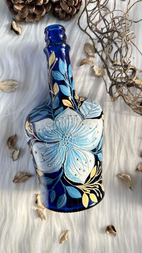 Debhashree | Blue white & gold themed Bottle customised for a wedding decor Sold out ✅ . . . . . . . #bottleart #bottlepainting #bottleservice… | Instagram Painting On A Bottle, Glass Jar Painting, Wine Bottle Painting, Bottle Art Ideas, Bottle Painting Ideas, Glass Bottle Painting, Glass Bottle Art, Bottle Paint, Bottle Art Projects