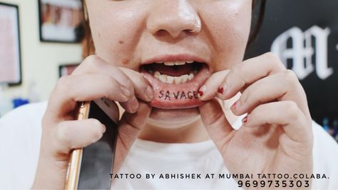 Underlips Tattoo  (SAVAGE TATTOO) @mumbaitattoocolaba  📲:+919967301133. • #tattoo #underlipstattoo #savagetattoo #lipstattoo #mumbaitattoocolaba #mumbaitattoo #tattooart #ink #inked Tattoo Savage, Om Wrist Tattoo, Heartbeat Tattoo On Wrist, Savage Tattoo, Couple Wrist Tattoos, Bird Hand Tattoo, Mouth Tattoo, Small Arrow Tattoos, Lips Tattoo