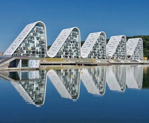 The Wave in Denmark by Henning Larsen Architects. DM for photo credit. #wave #building #modern #architecture #design… Waves In Architecture, Vejle Denmark, Architecture 101, Henning Larsen, Danish Architecture, Awesome Architecture, Airport Design, Vejle, Apartment Architecture