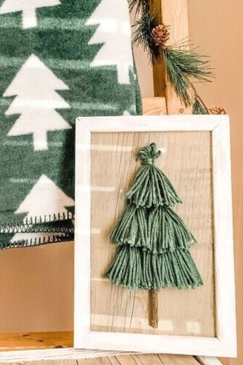 Tassel Christmas Tree, Cheap Christmas Crafts, Tassel Christmas, Christmas Tree Sign, Yarn Clothes, Yarn Trees, Living Room Fireplace, Tree Sign, Room Fireplace