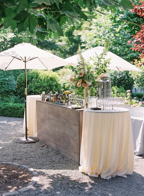 Garden Wedding By The Beach, Backyard Party Fence Decor, Garden Wedding Cocktail Tables, Bistro Tables Wedding, Outdoor Wedding Bar Table, Summer Wedding Garden Party, May Garden Wedding, Backyard Wedding Lounge Area, Cocktail Hour Poolside Wedding