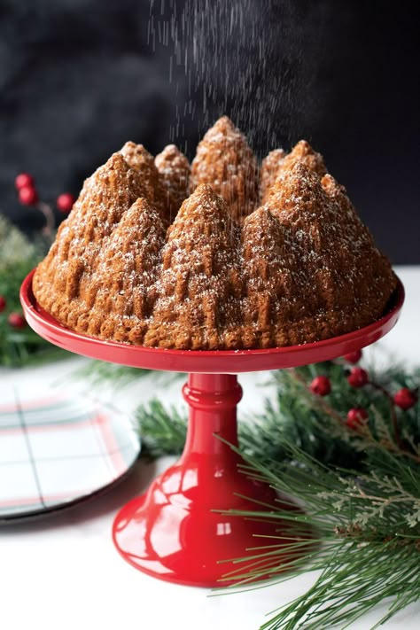 Baked vanilla chai spiced Bundt cake in Pine Forest Bundt design on a cake stand, dusted with powdered sugar Tin Cakes, Eggnog Cake, Chai Spices, Holiday Cake, Food Issues, Christmas Cozy, Cake Vanilla, Bundt Cake Pan, Vanilla Chai