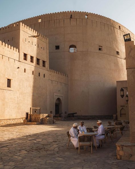 Nizwa is one of Oman’s oldest cities and a labyrinth of tradition 🇴🇲 Immerse yourself in the vibrant maze of Nizwa’s historic district, where the imposing Nizwa Fort presides over a symphony of mudbrick architecture and bustling marketplaces. Surrounded by mountains and rich in culture, Nizwa is a perfect city for those fascinated by the past and diverse cultures. 📸 @awonderseeker #VirtuosoTravel #SoVirtuoso Oman Culture, Journal Cutouts, Nizwa Oman, Travelling Asia, Historic District, Old City, Architectural Digest, Asia Travel, Arabic Quotes