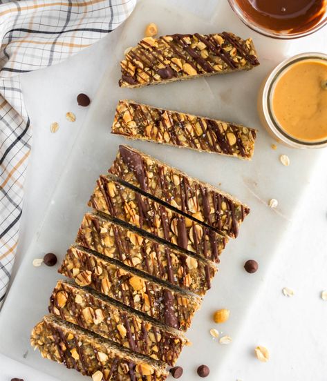 nce drizzle is solid, slice in to 8 bars. Store in an airtight container in the fridge for 5-7 days . You can wrap the bars individua Peanut Butter Granola Bars, Flax Meal, No Bake Granola Bars, Baked Granola, Healthy Food Habits, Crock Pot Freezer, Peanut Butter Granola, No Bake Bars, Collagen Protein