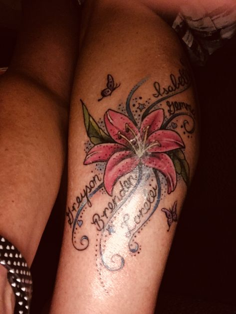 Tattoo with grandkids names Tattoos With Grandkids Names, Grandkids Names Tattoo, Tattoo Ideas With Grandkids Names, Lilly Tattoo With Name, Grandkid Tattoo Ideas, Tattoo Ideas For Grandchildren Names, Lily Tattoo With Name, Tattoo Ideas For Grandkids Names, Children Names Tattoos For Women