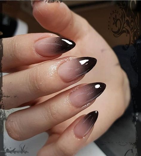 Warning: These nail art ideas may cause extreme jealousy and an overwhelming desire to promptly schedule your next appointment at the salon! So, if you’re not prepared to have the most enviable nails in town, it may be best to turn back now. . ..  . Black Gradient Almond Nails, Almond Shape October Nails, Reverse Black Ombre Nails, Black Ombre Almond Shaped Nails, Dark Ombre Nails Almond, Gothic Dip Powder Nails, Black French Ombre Nails, Sharp Halloween Nails, Black Ombre Halloween Nails