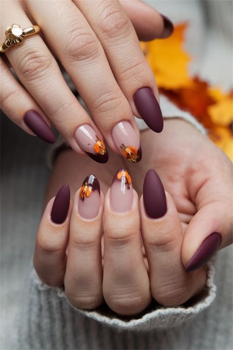 Embrace the beauty of autumn with these stunning almond-shaped fall nail ideas! Picture warm, creamy taupe intertwined with rich burnt orange and deep burgundy accents, all perfectly contrasting against the classic almond silhouette. This design captures the essence of the season, making your nails a true reflection of fall窶冱 cozy charm. Get ready to turn heads and showcase your seasonal spirit with this elegant nail style! Almond Shaped Fall Nail Designs, Thanksgiving Nails Almond Shape, Fall Almond Shaped Nails, Almond Autumn Nails, Fall Almond Nails, Fall Acrylic, Fall Nail Ideas, Elegant Nail, November Nails