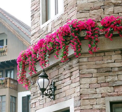 artificial flowers hanging on outside wall Artificial Wall Plants Decor Outdoor, Artificial Flower Wall Garden, Using Fake Flowers Outdoors, Artificial Flower Hanging Decor, Faux Flower Hanging Basket, Artificial Flowers Outdoors, Hanging Flowers Wedding, Hydrangea Garland, Flowers Hanging