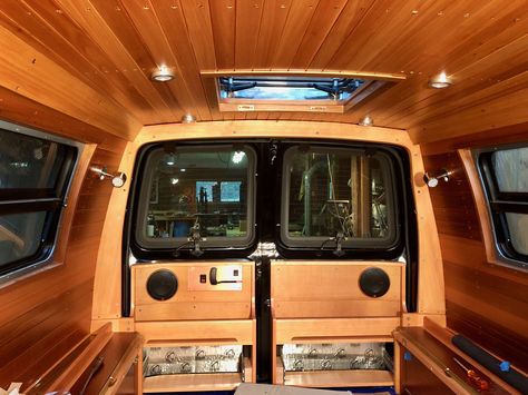 A custom van interior by Brookfield Woodworking in Cushing, Maine.  The woods used are red cedar for the walls, white cedar for the ceiling, teak window trim,  cypress and douglas fir for the cabinetry.   The vehicle is a new Chevy Express 4x4.  Please visit www.brookfieldwoodworking.com for more pictures of this project.     #vanbuild  #vanlife #madeinmaine #overlandvan #aluminess #travel #travelvan Cedar Ceiling, Custom Van Interior, New Chevy, Small Theatre, Dodge Van, Chevy Express, Mini Bus, Van Interior, White Cedar