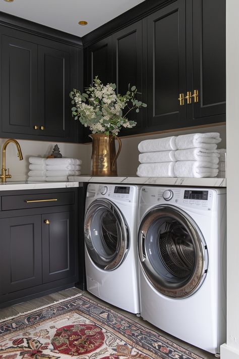 Transform your laundry space with these 44 stunning laundry room ideas to inspire you! From clever storage solutions to stylish design tips, discover how to make your laundry room both functional and beautiful. 🧺✨ #LaundryRoom #HomeInspiration #InteriorDesign Black Walls In Laundry Room, Dark Gray Laundry Room Cabinets, Black Washer And Dryer Laundry Room, Chic Laundry Room Ideas, Best Laundry Room Ideas, Dark Laundry, Black And White Laundry Room, Chic Laundry Room, Opulent Decor