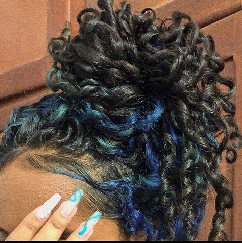 Blue Money Piece Curly Hair, Blue Streaks Curly Hair, Brown Curly Hair With Blue Highlights, Black And Blue Curly Hair, Blue Highlights Curly Hair, Curly Hair Peekaboo Color, Blue Highlights In Black Hair, Curly Blue Hair, Black Hair With Blue Highlights