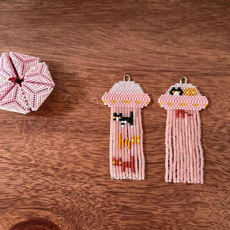 This picture of these cuties was sitting in my phone and I just had to show you 🧡 © Copyright 2022 I do not consent to my designs being… | Instagram Selling Stand, Seed Bead Jewelry Patterns, Brick Stitch Earrings, Seed Bead Patterns, Beaded Earrings Patterns, Pride Merch, Beaded Crafts, Bead Loom, Beaded Animals