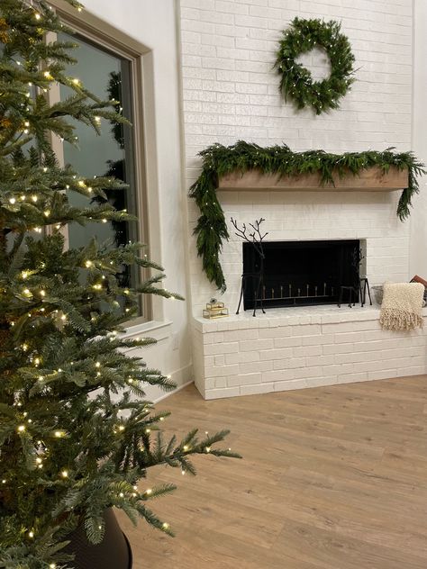 Christmas decor, christmas garland, holiday decor Garland Tv Stand Christmas, Chimney Christmas Decor, Norfolk Pine, Minimal Christmas, Christmas Garland, Decor Christmas, Norfolk, Christmas Decor, Christmas Decorations