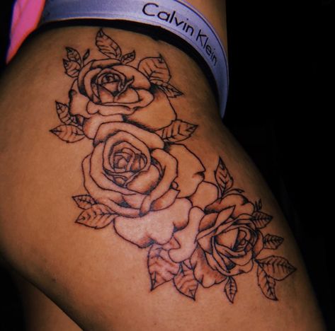 Rose Hip Tattoo Thigh Tat, Baddie Tattoo Ideas Female Thigh, Chest Tattoo Female Meaningful, Flower Thigh Tattoos Black Women, Hip Rose Tattoos Women, Rose Thigh Tattoos Women, Rose Stomach Tattoo, Thigh Rose Tattoo, Baddie Tattoo Ideas Female Leg