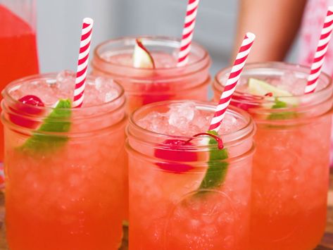 Homemade Cherry Limeade Recipe | I started making homemade cherry limeade for our annual Fourth of July party, and now it's become a special summer treat that I find myself making quite often. There's something about it that is quintessentially summer, and it's a childhood favorite that adults don't have to be ashamed to say they adore. Plus, it's great spiked with vodka for a cool cocktail. Mocktails Non Alcoholic Big Batch, Tailgating Drinks, Easter Punch Recipes, Easter Punch, Tailgate Drinks, Cherry Limeade Recipe, Sonic Cherry Limeade, Christmas Drinks Alcohol Recipes, Limeade Recipe