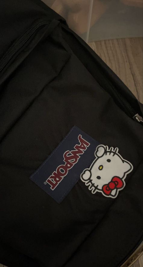 black hello kitty jansport Hello Kitty Backpack Jansport, Jansport Black Backpack, Backpack Decoration Accessories, Hello Kitty Patches On Backpack, Decorating Jansport Backpack, Black Jansport Backpacks Hello Kitty, Black Backpack With Patches, Black Jansport Backpacks Aesthetic Pins, Decorated Jansport Backpack