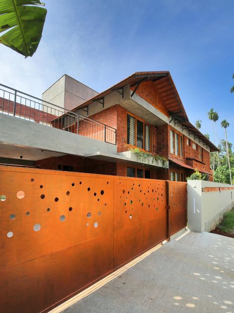 We travel to Kerala to visit the striking brick house of Trivandrum! | Goodhomes.co.in Gate Design Modern, Brick Construction, Exposed Concrete, Architecture Awards, The Brick, House Elevation, Nature Indoors, Gate Design, Exposed Brick