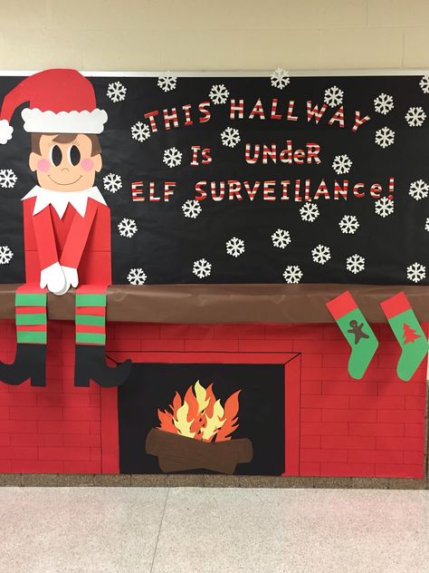 School Christmas Bulletin board! Christmas Decor School Classroom Door, Classroom Door Decor For Christmas, Fireplace Bulletin Boards For School, December Bulletin Boards For School, Bulletin Board Fireplace, Christmas School Board Decorations, School Bulletin Boards Christmas, Teacher Winter Bulletin Boards, December Board Ideas